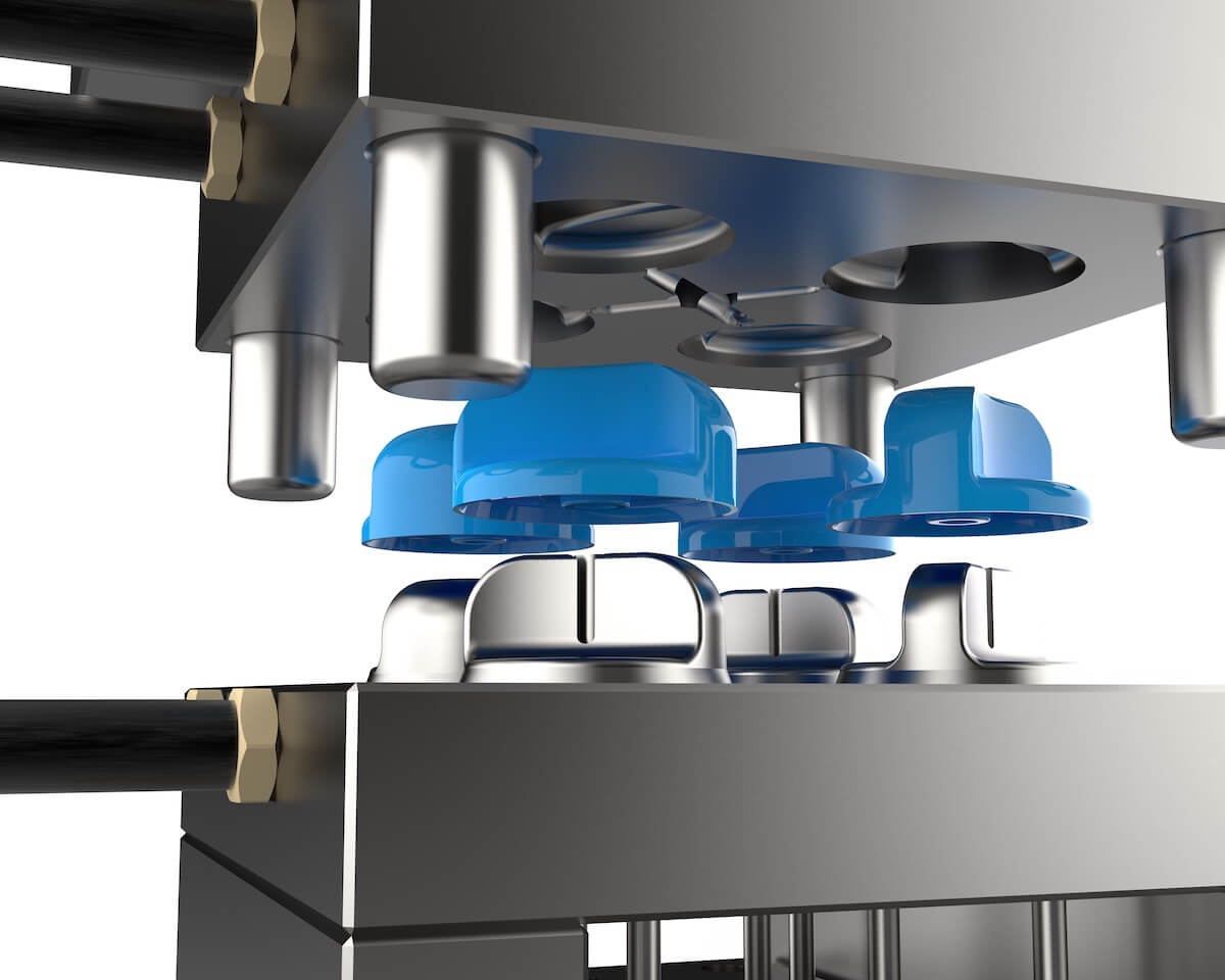injection molded products being finished